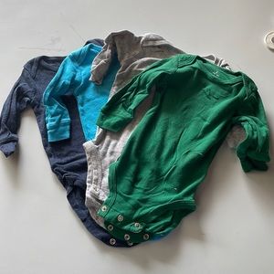 Carter’s three month onesies, four different colors blue green gray